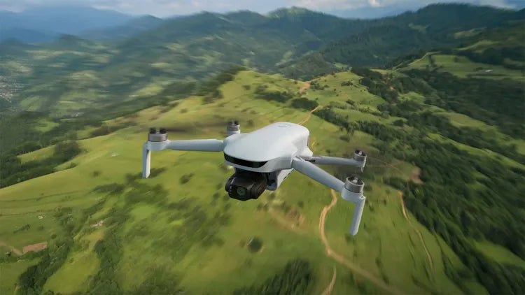 Potensic Atom 3 camera drone flying over a European alpine landscape